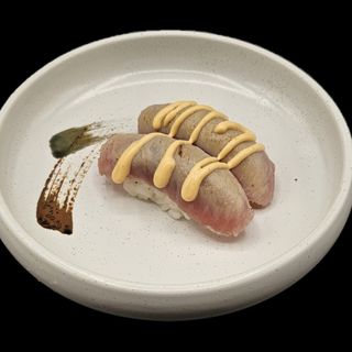 65. Flambe spicy maguro nigiri