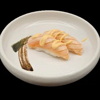 62. Flambe spicy sake nigiri