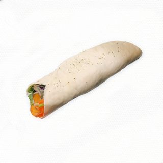 Piadina farcita con prosciutto cotto, pomodoro, mozzarella e insalata