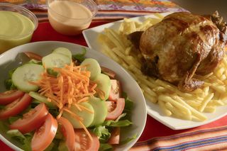 Pollo a la brasa intero con contorni