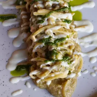 Tonnarelli con crema di melanzana e provola affumicata