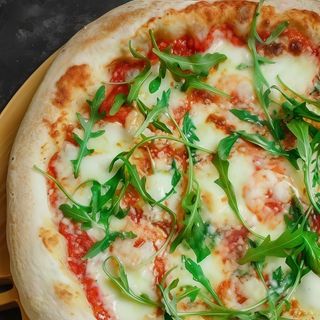 Pizza gamberetti e rucola
