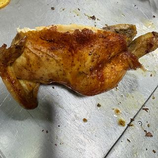Mezzo pollo a legna