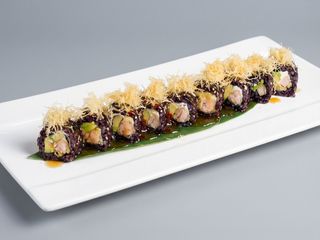 Uramaki black salmon croc roll