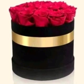 flower box tonda con Rose rosse fresche