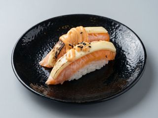 50. Nigiri sake cheese fire