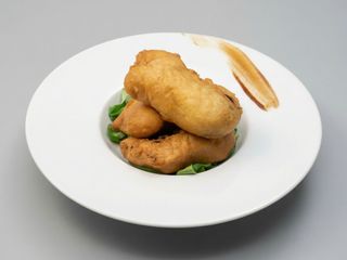 Fiori di zucca ripieni di mozzarella e acciughe