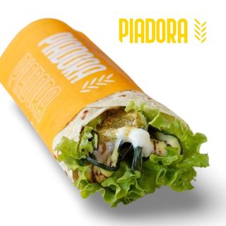 Zucchine grigliate, lattuga, stracciatella e pesto di pistacchi