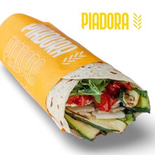 Zucchine grigliate, grana, rucola e pomodorini secchi