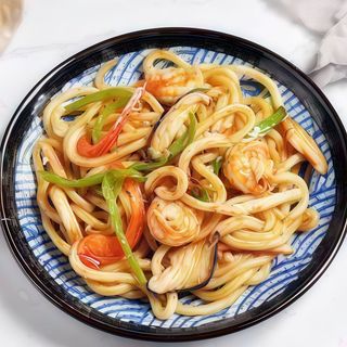 25 Spaghetti udon con gamberi