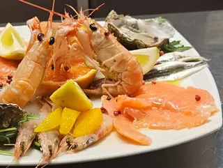 Cruditè marinati and marinated e local crudite fish'di pesce al profumo di limone