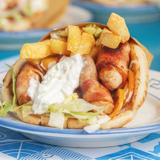 Pita Souvlaki pollo e bacon