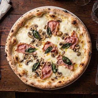 Pizza prosciutto e funghi
