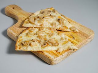 Pizza porcini al piatto