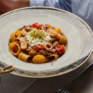 Calamarata con funghi cardoncelli