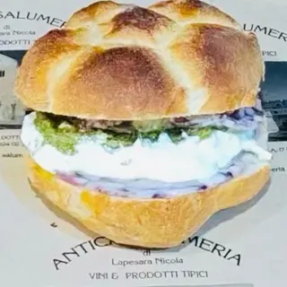 Rosetta carpaccio di polpo stracciatella e pomodoro sott’olio