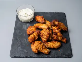 Alette e coscette di pollo 4 pezzi