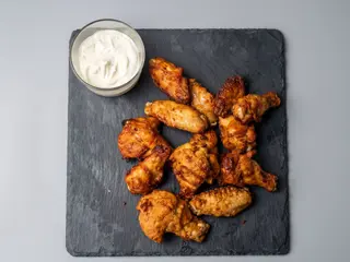Alette e coscette di pollo alla parika 4 pezzi