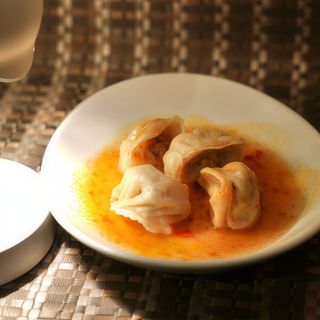 Ravioli in salsa piccante - 4 pezzi