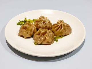 19 A. Xiao long bao alla piastra