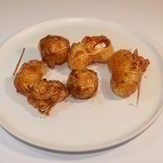 87. Frutta mista caramellata (mela, banana, ananas)