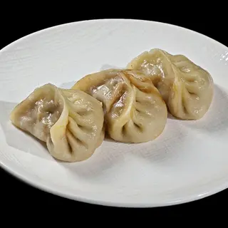 9. Ravioli di carne al vapore - 4 pezzi