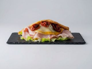 11. Panzerotto Porchetta e Fonduta di caciocavallo