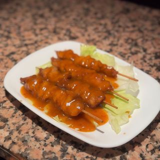 Spiedini di pollo in salsa speziata