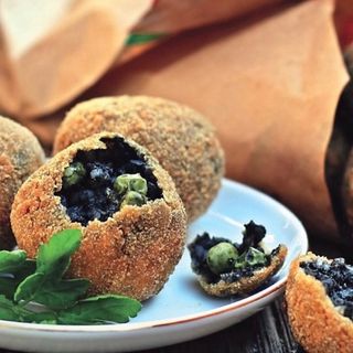 Arancinette al nero di seppia