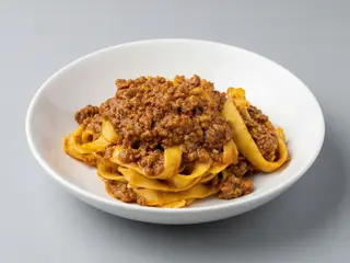 Tagliatelle tirate al mattarello con Ragù Bolognese
