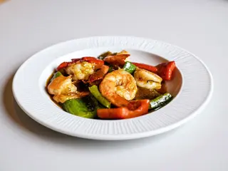 Gamberetti al curry rosso