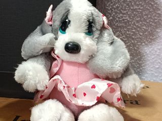 piccola cucciola peluche