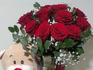 9 rose rosse con peluche