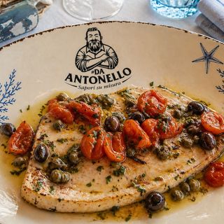 Trancio di spada olive capperi e pomodorini