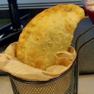 Empanada di prosciutto e formaggio