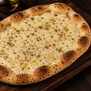 Pinsa romana biancha cacio e pepe