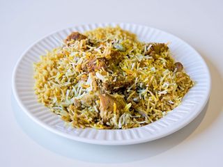 Chicken biryani + Coca-Coal Lattina 330ml