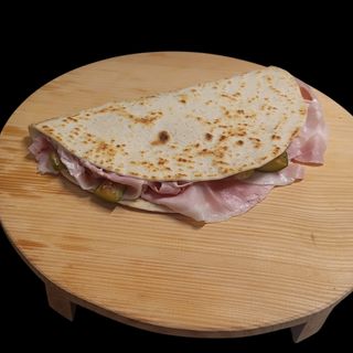 Prosciutto cotto, crema di gorgonzola e zucchine trifolate