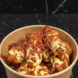 Alette di pollo panate - 4 pezzi (Le salse non sono incluse)