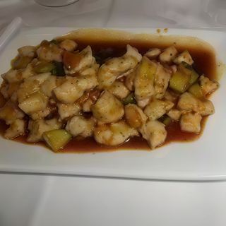 22. Pollo con salsa piccante