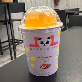 Bubble tea peach red tea mango pearls
