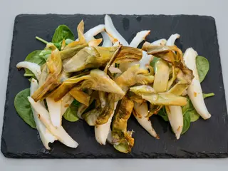 Tagliata di seppia gratinata alle mandorle