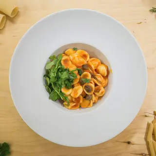 Orecchiette con Zabaione di Pomodoro, Olive Taggiasche e Rucola