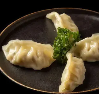 46 Ravioli alla piastra - 4 pezzi