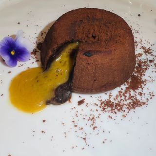 SOUFFLÉ NERO AL PISTACCHIO
