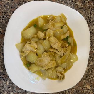 70. Pollo con curry