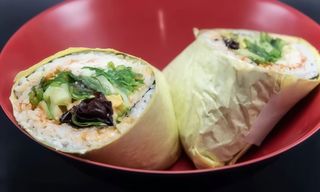 Cooked salmon poke burrito