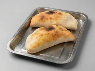 Calzone al forno con prosciutto