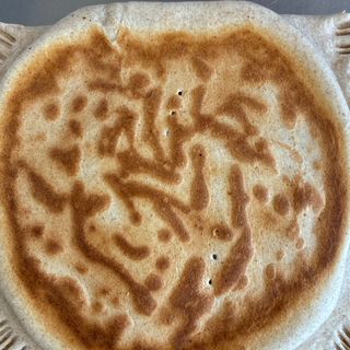 Piadina mortadella, rucola e squacquerone