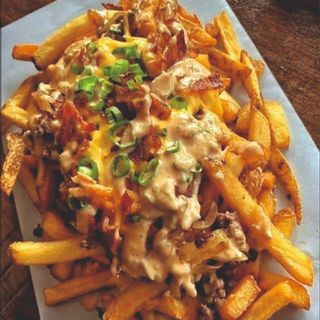 Patete fritte con pollo e speck